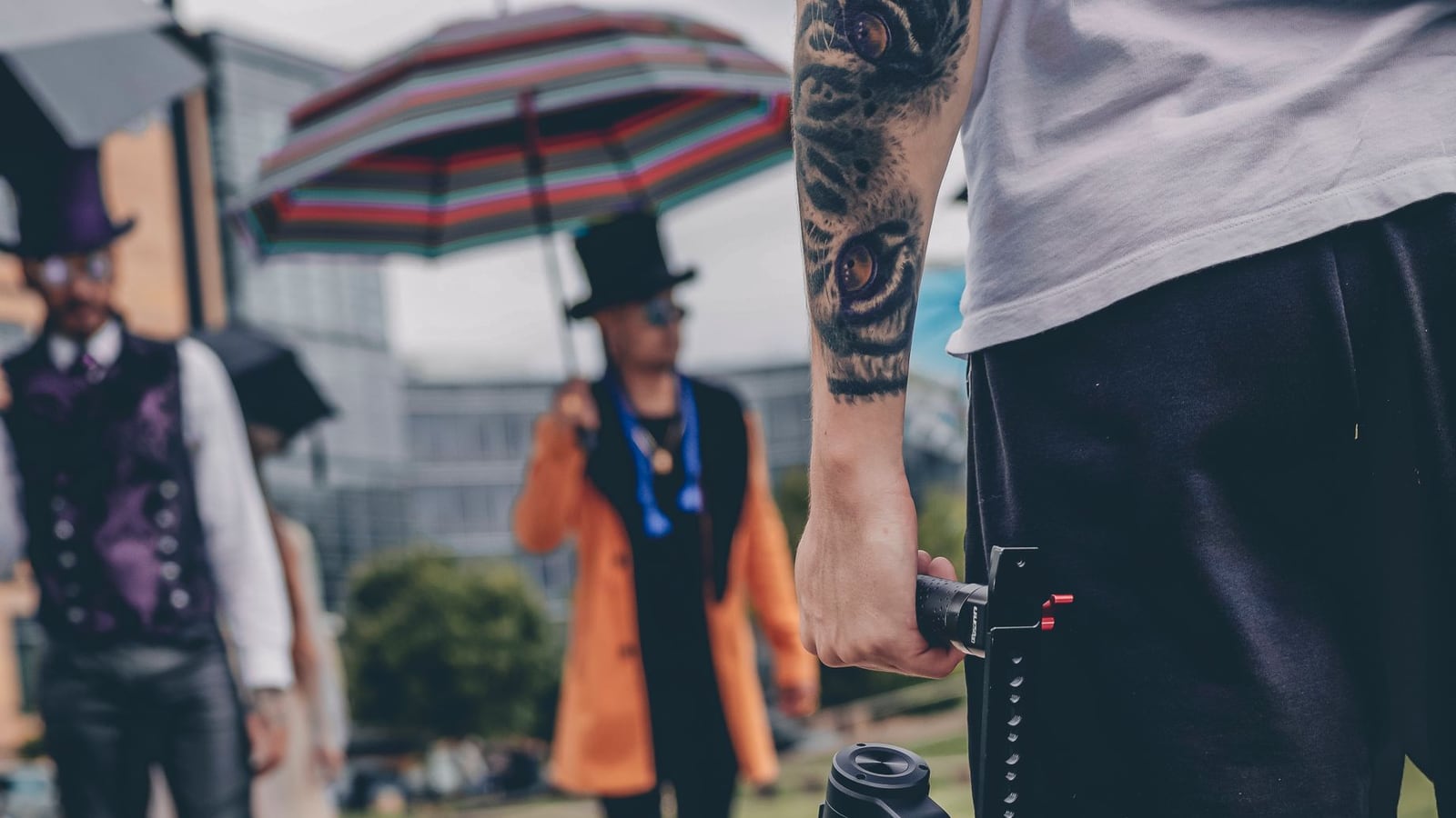 A videographer capturing dynamic footage at a professional corporate event in Melbourne.
