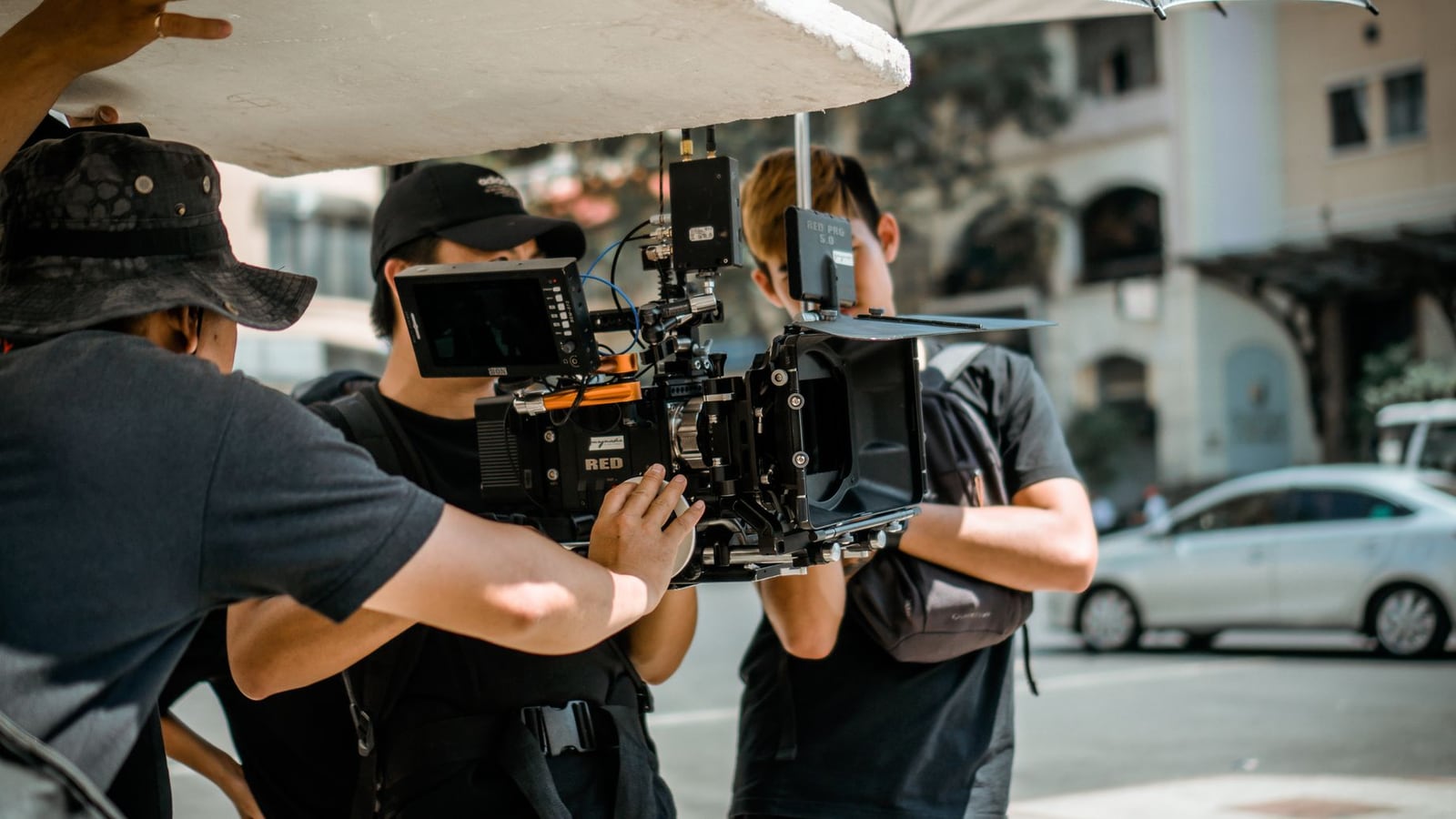 A production crew coordinating location permissions on a Melbourne city street.