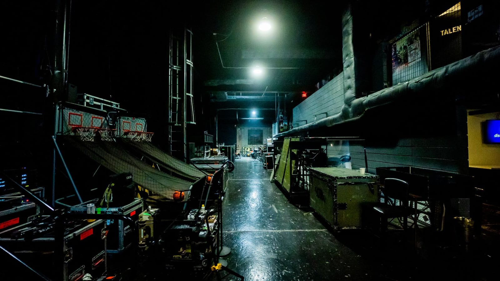 Cinematic music video filming in a moody industrial warehouse location in Melbourne.